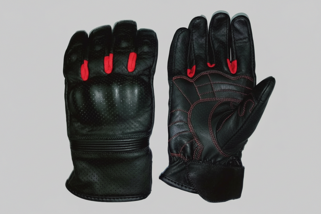Black leather gloves with red accents on a white background